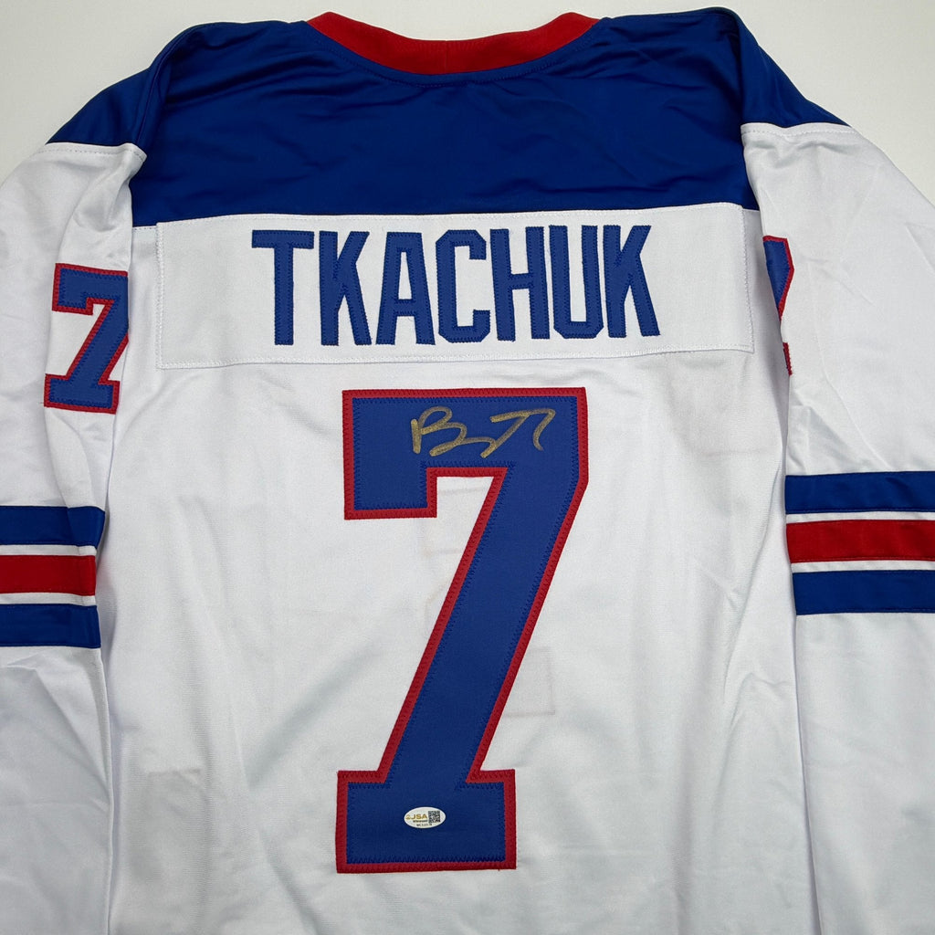 Autographed/Signed Brady Tkachuk USA United States 2026 Olympics Gold Medal White Hockey Jersey JSA COA