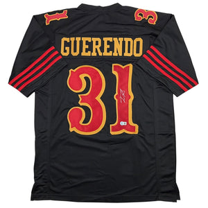 Autographed/Signed Isaac Guerendo San Francisco Black Rivalries Collection Football Jersey Beckett BAS COA