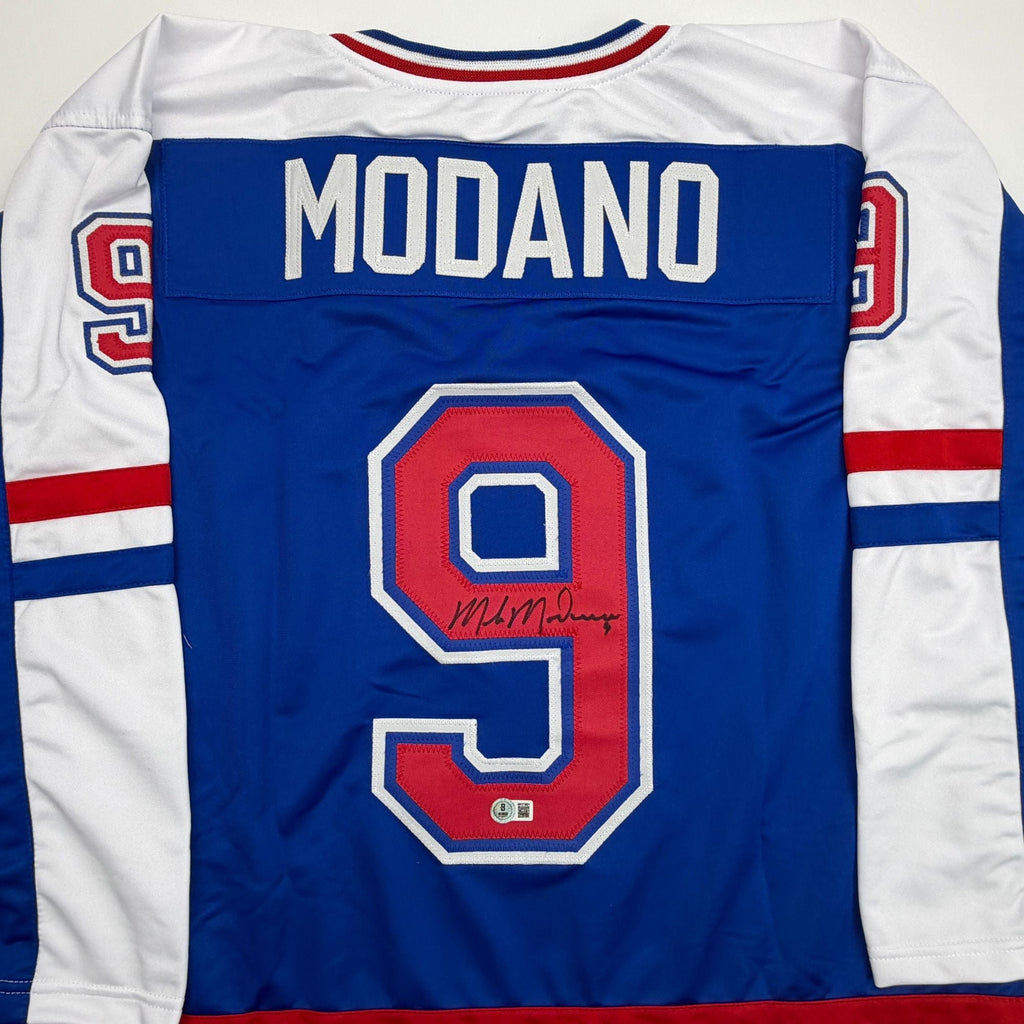 Autographed/Signed Mike Modano Team USA Blue Hockey Jersey Beckett BAS COA
