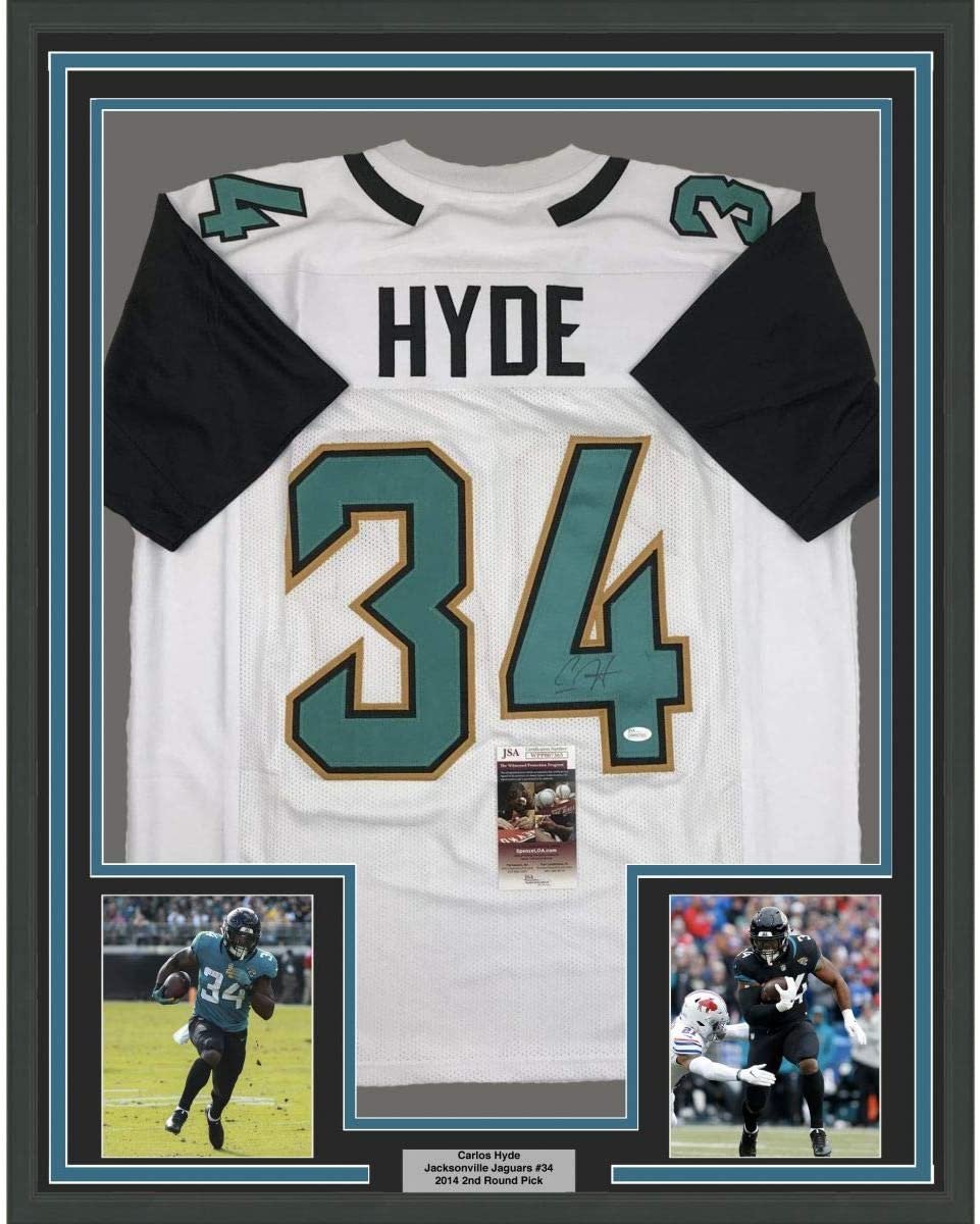 Framed Autographed/Signed Carlos Hyde 35x39 Jacksonville White Football Jersey JSA COA