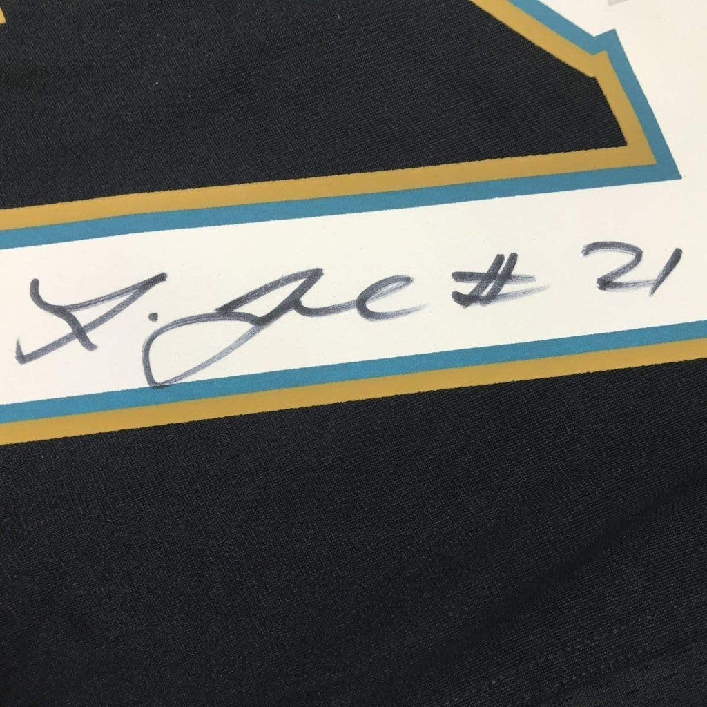 Framed Autographed/Signed Leonard Fournette 35x39 Jacksonville Black Football Jersey Fanatics COA