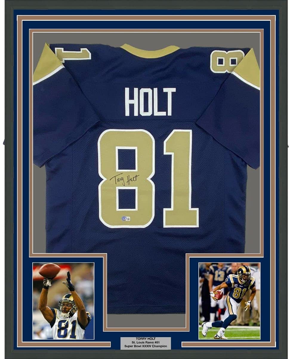 Framed Autographed/Signed Torry Holt 35x39 St. Louis Dark Blue Football Jersey Beckett BAS COA