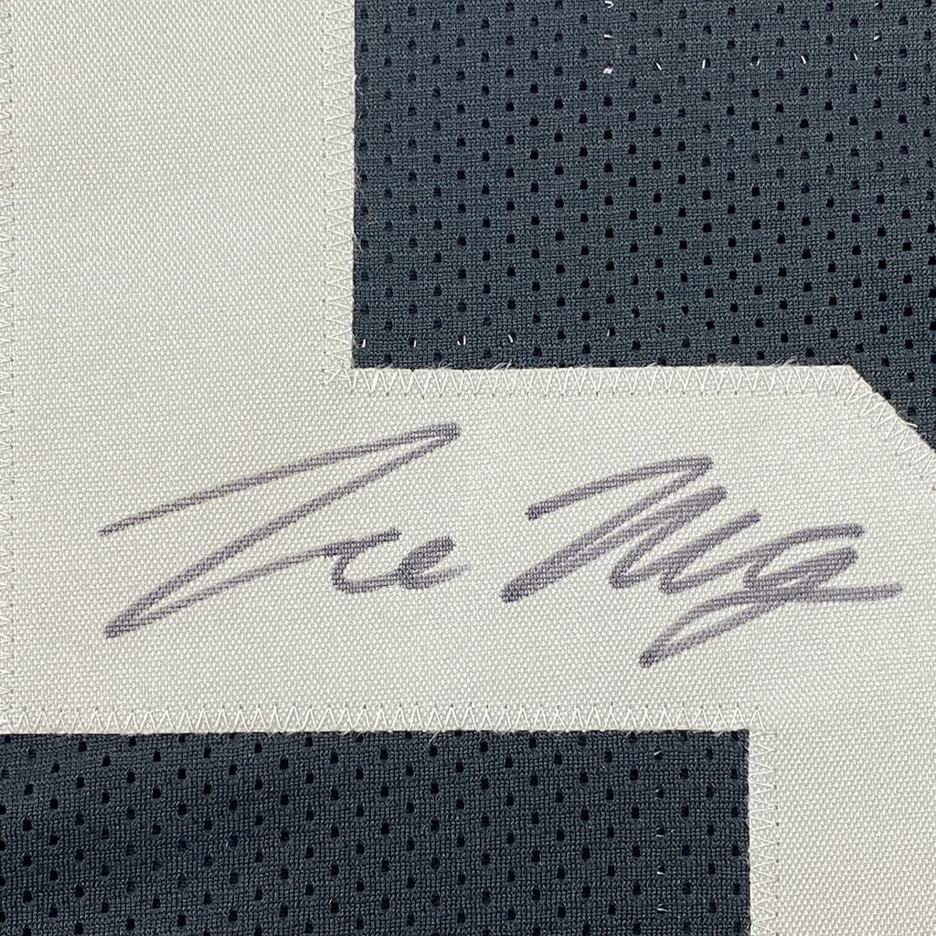 Framed Autographed/Signed Trevon Moehrig 35x39 Las Vegas Oakland Black Football Jersey JSA COA