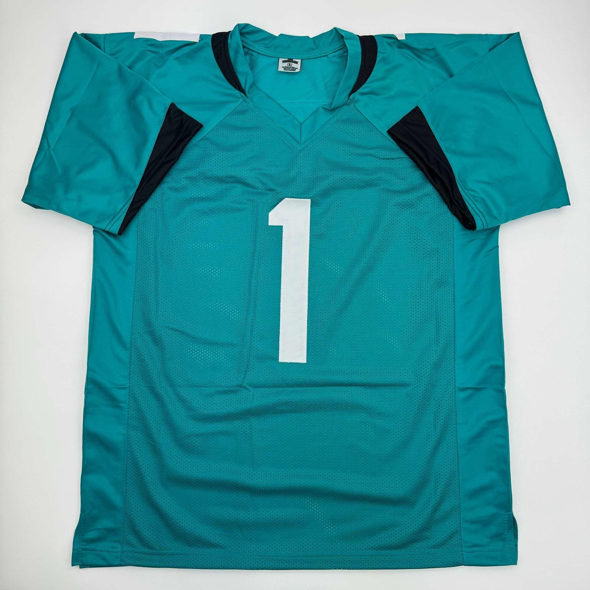 Autographed/Signed Travis Etienne Jr. Jacksonville Teal Football Jersey Beckett BAS COA