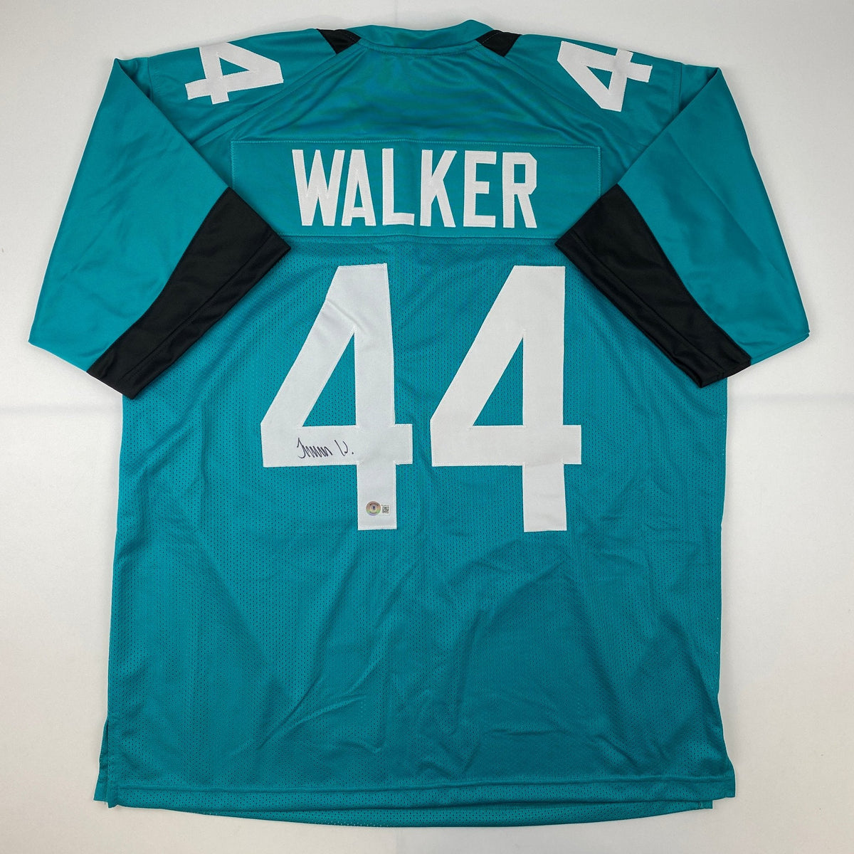Autographed/Signed Travon Walker Jacksonville Teal Football Jersey Beckett BAS COA