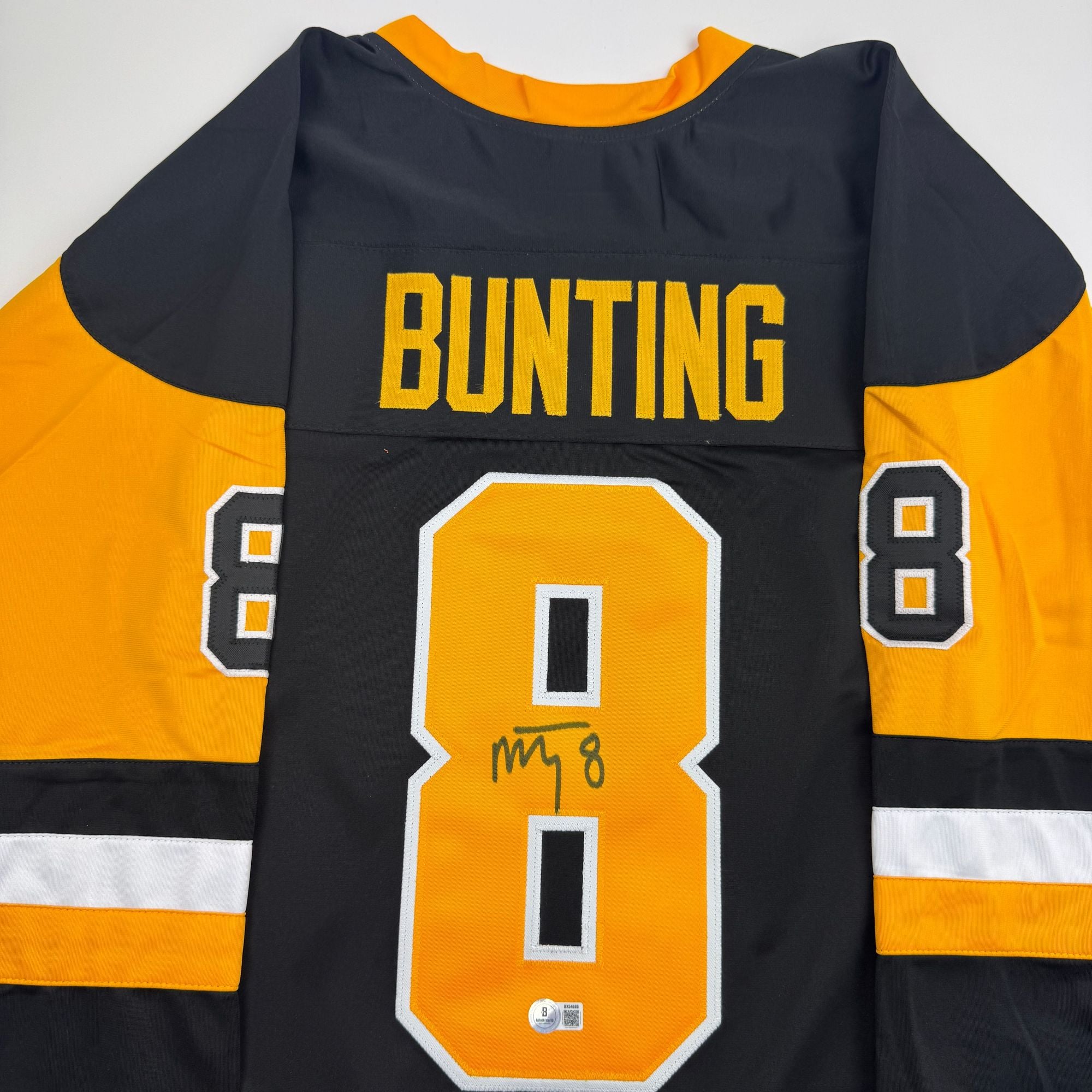 Autographed/Signed Michael Bunting Pittsburgh Black Hockey Jersey Beckett BAS COA
