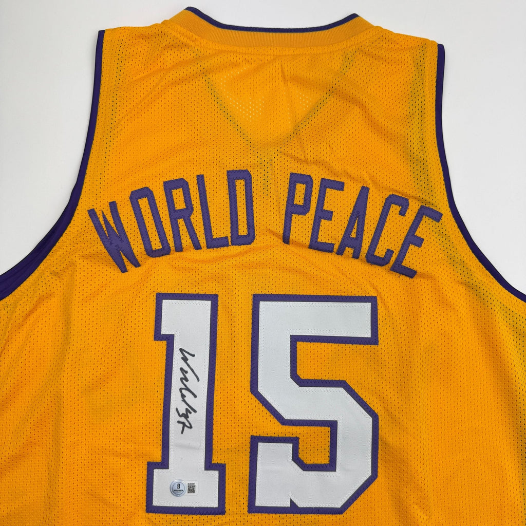 Autographed/Signed Ron Artest Metta World Peace Los Angeles Yellow Basketball Jersey Beckett BAS COA