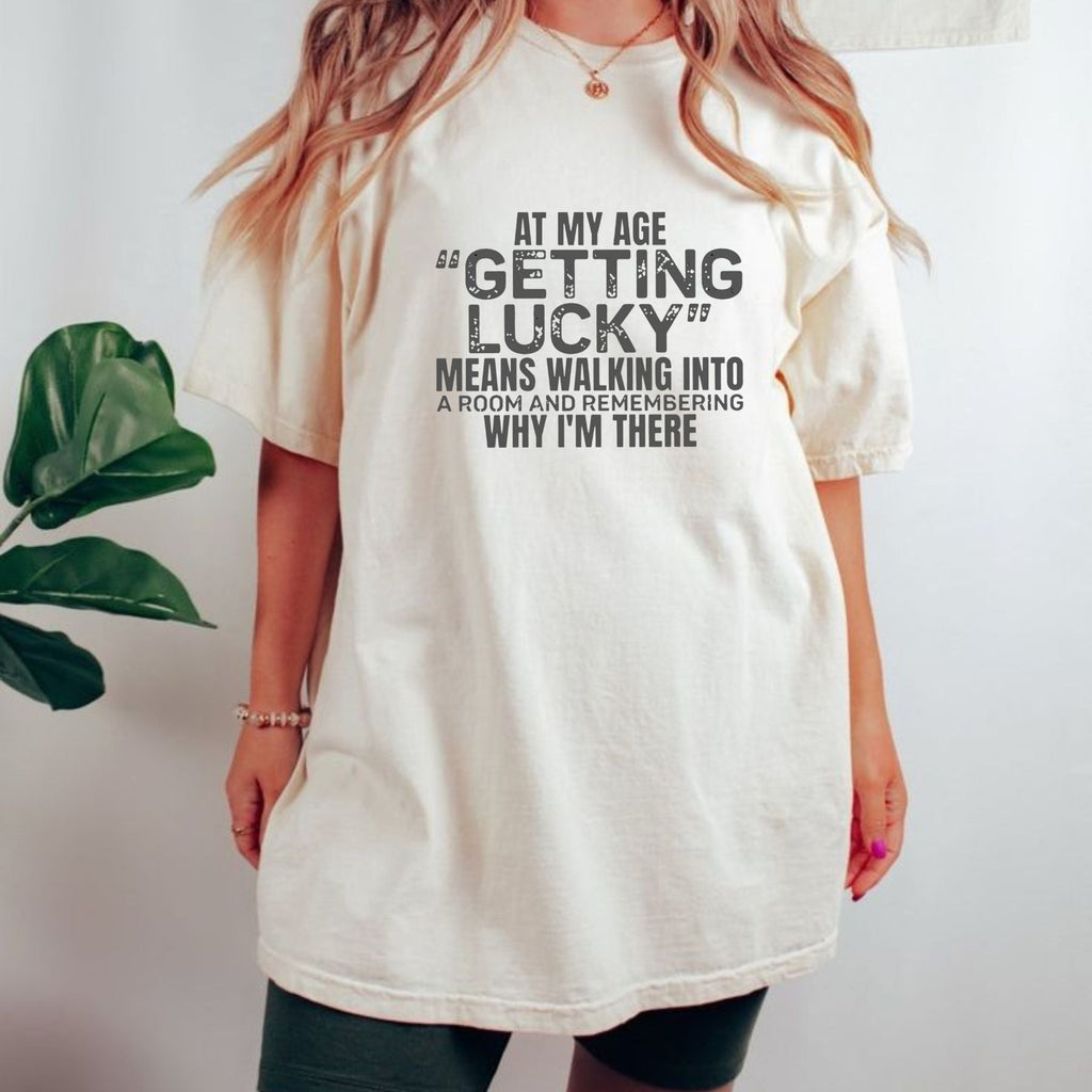 "At My Age Getting Lucky" Funny T-Shirt – Sarcastic Aging Humor Graphic Tee, Unisex Cotton Shirt