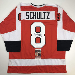 Autographed/Signed Dave Schultz The Hammer Philadelphia Orange Hockey Jersey JSA COA