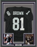 Framed Autographed/Signed Tim Brown 35x39 Oakland Black Football Jersey JSA COA Holo Only