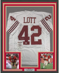 Framed Autographed/Signed Ronnie Lott 35x39 San Francisco 49ers White Football Jersey JSA COA