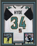 Framed Autographed/Signed Carlos Hyde 35x39 Jacksonville White Football Jersey JSA COA