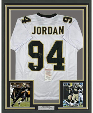 Framed Autographed/Signed Cam Cameron Jordan 35x39 New Orleans White Football Jersey JSA COA
