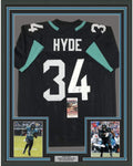 Framed Autographed/Signed Carlos Hyde 35x39 Jacksonville Black Football Jersey JSA COA