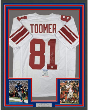 Framed Autographed/Signed Amani Toomer 35x39 New York White Football Jersey PSA/DNA COA