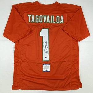 Autographed/Signed Tua Tagovailoa Miami Orange Football Jersey Beckett BAS COA