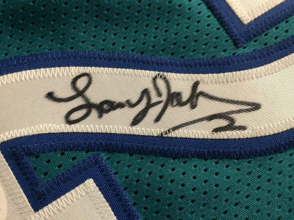 Framed Autographed/Signed Larry Johnson 35x39 Charlotte Teal Basketball Jersey JSA COA
