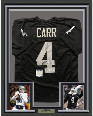 Framed Autographed/Signed Derek Carr 35x39 Oakland Black Football Jersey Beckett BAS COA