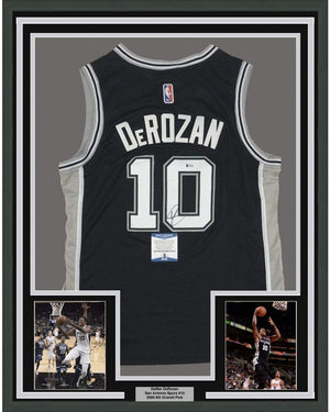 Framed Autographed/Signed DeMar DeRozan 35x39 San Antonio Black Basketball Jersey Beckett BAS COA