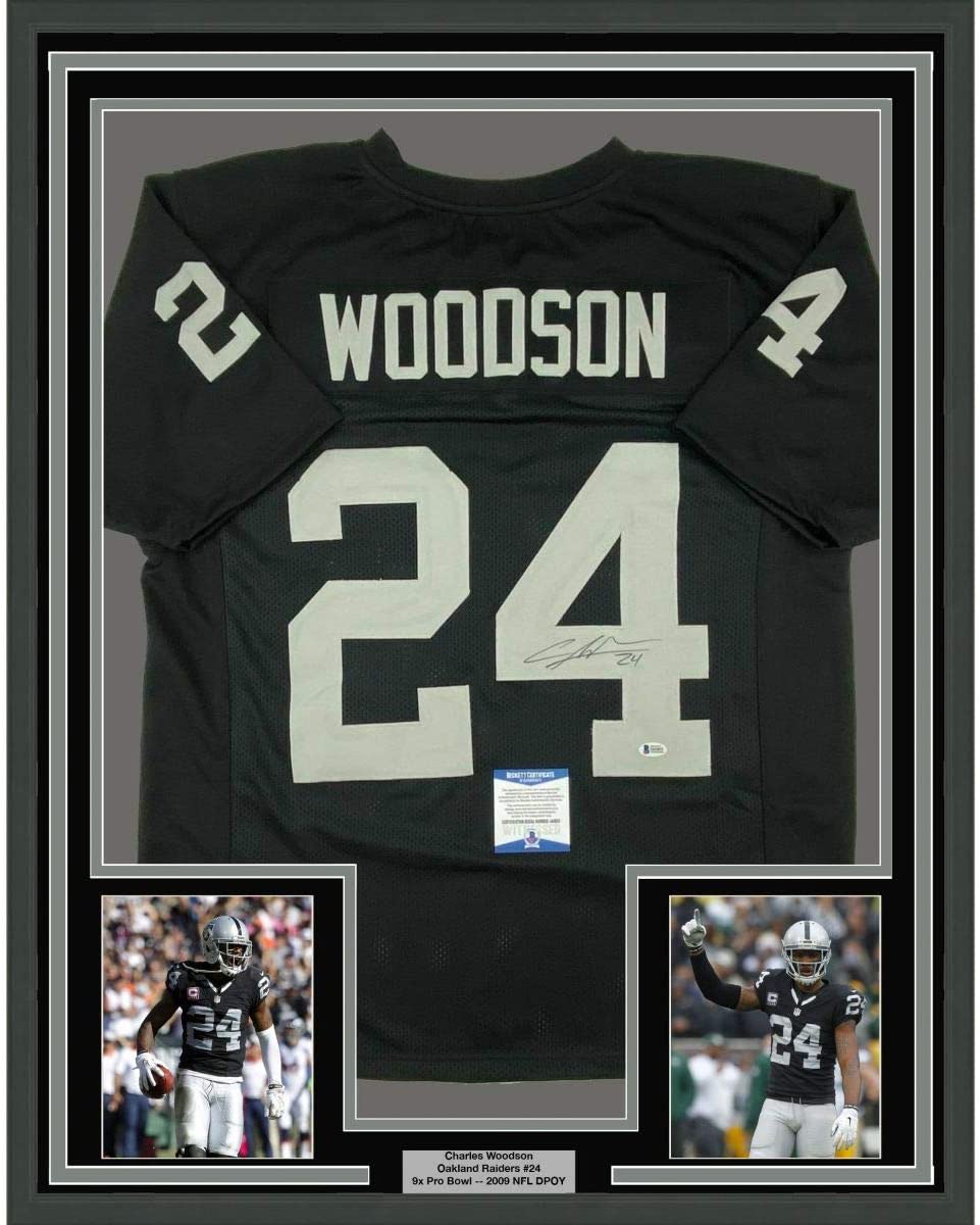 Framed Autographed/Signed Charles Woodson 35x39 Oakland Black Football Jersey Beckett BAS COA