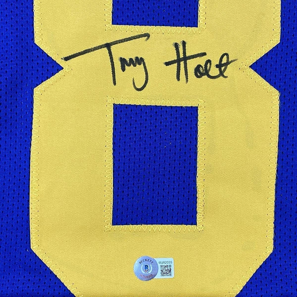 Framed Autographed/Signed Torry Holt 35x39 St. Louis Retro Blue Football Jersey Beckett BAS COA