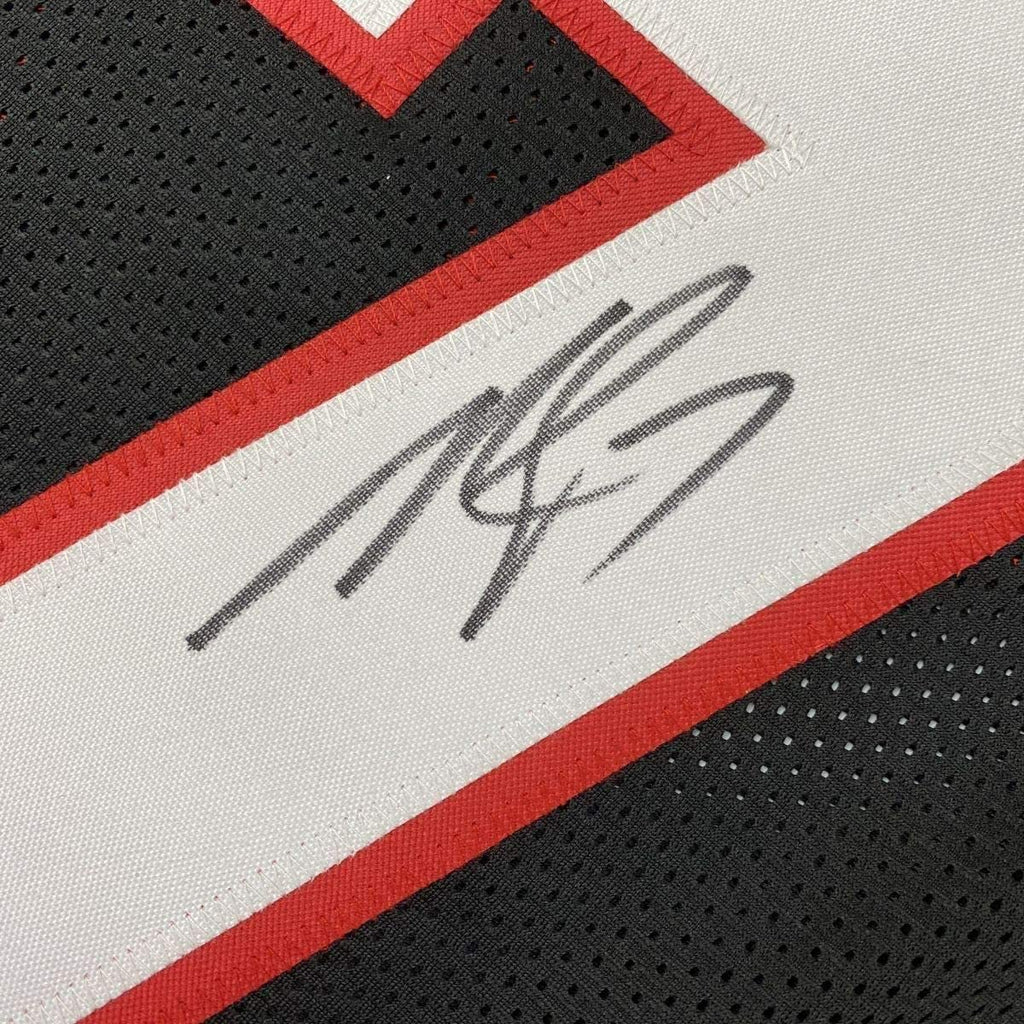 Framed Autographed/Signed Michael Mike Vick 35x39 Atlanta Retro Black Football Jersey JSA COA