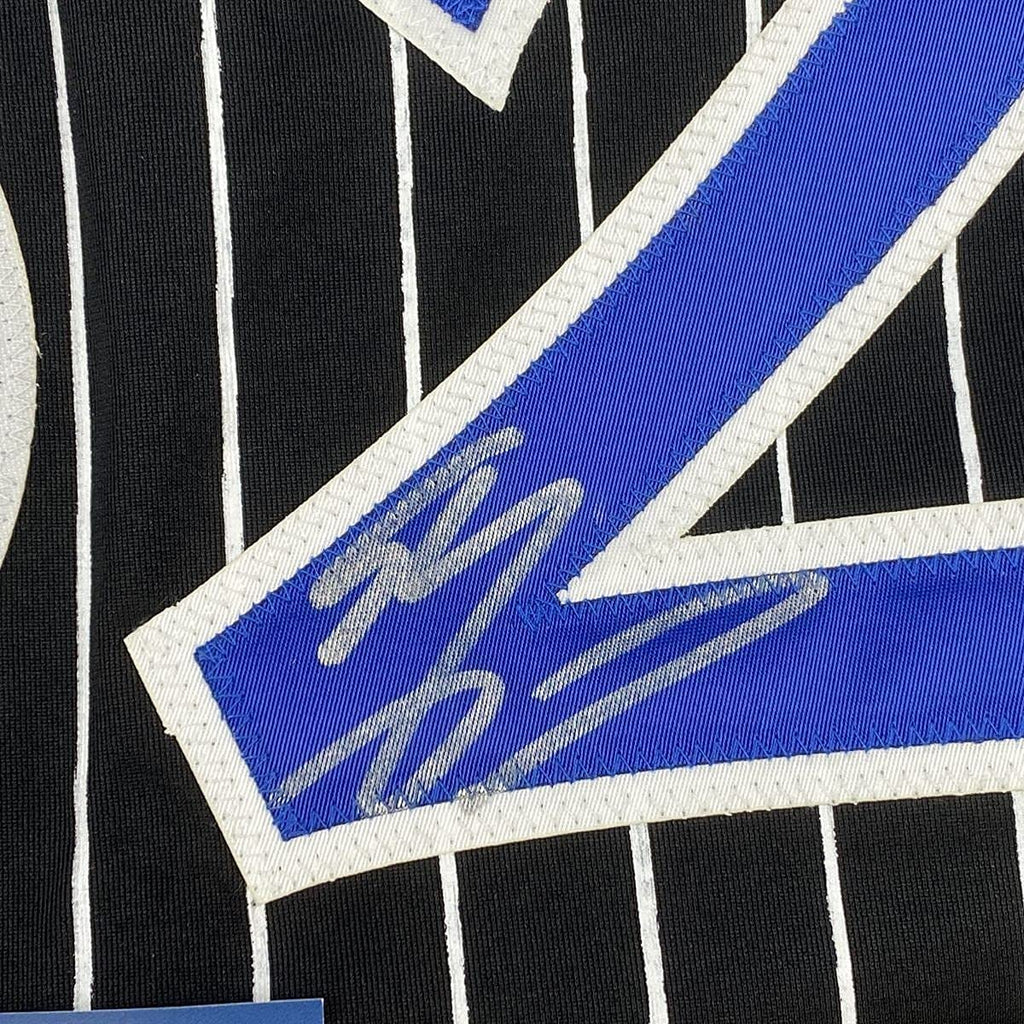 Framed Autographed/Signed Shaquille Shaq O'Neal 35x39 Orlando Black Pinstripe Basketball Jersey Beckett BAS COA