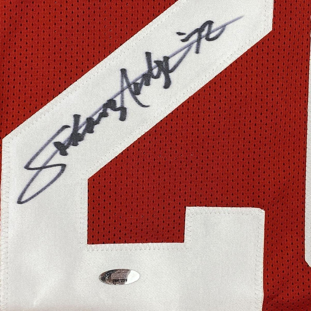 Framed Autographed/Signed Johnny Rodgers 35x39 Nebraska Red College Football Jersey Tristar COA Holo Only