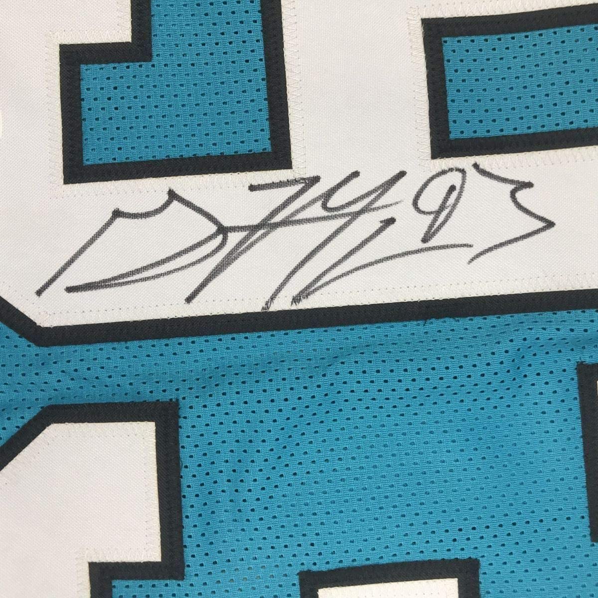 Framed Autographed/Signed Gerald McCoy 35x39 Carolina Blue Football Jersey Beckett BAS COA