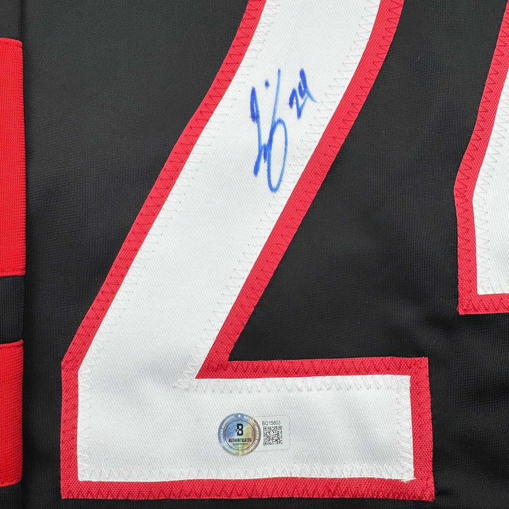 Framed Autographed/Signed Seth Jarvis 35x39 Carolina Black Hockey Jersey Beckett BAS COA