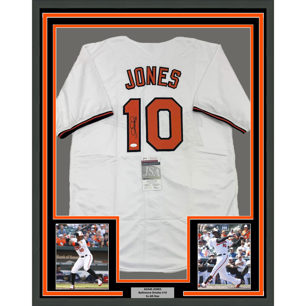 Framed Autographed/Signed Adam Jones 35x39 Baltimore White Baseball Jersey JSA COA