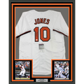Framed Autographed/Signed Adam Jones 35x39 Baltimore White Baseball Jersey JSA COA