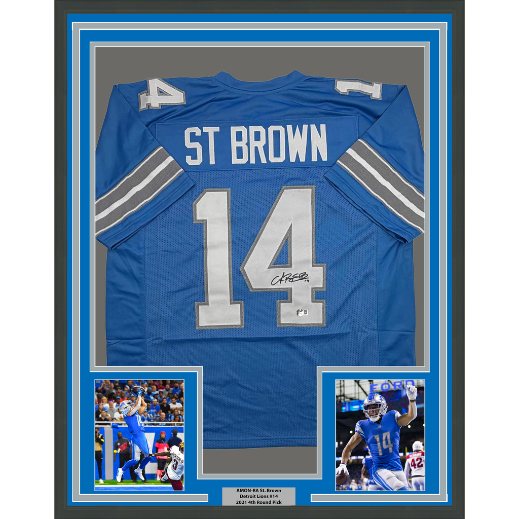 Framed Autographed/Signed Amon-Ra St. Brown 35x39 Detroit Current Blue Football Jersey Beckett BAS COA