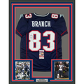 Framed Autographed/Signed Deion Branch 35x39 #83 New England Blue Football Jersey JSA COA