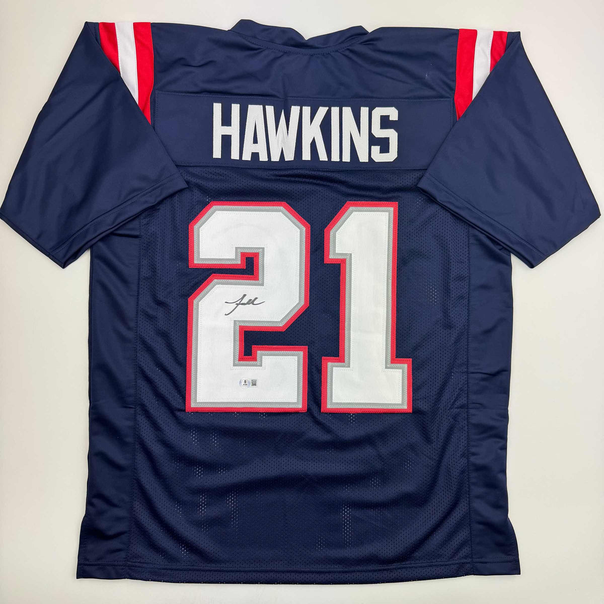 Autographed/Signed Jaylinn Hawkins New England Blue Football Jersey Beckett BAS COA