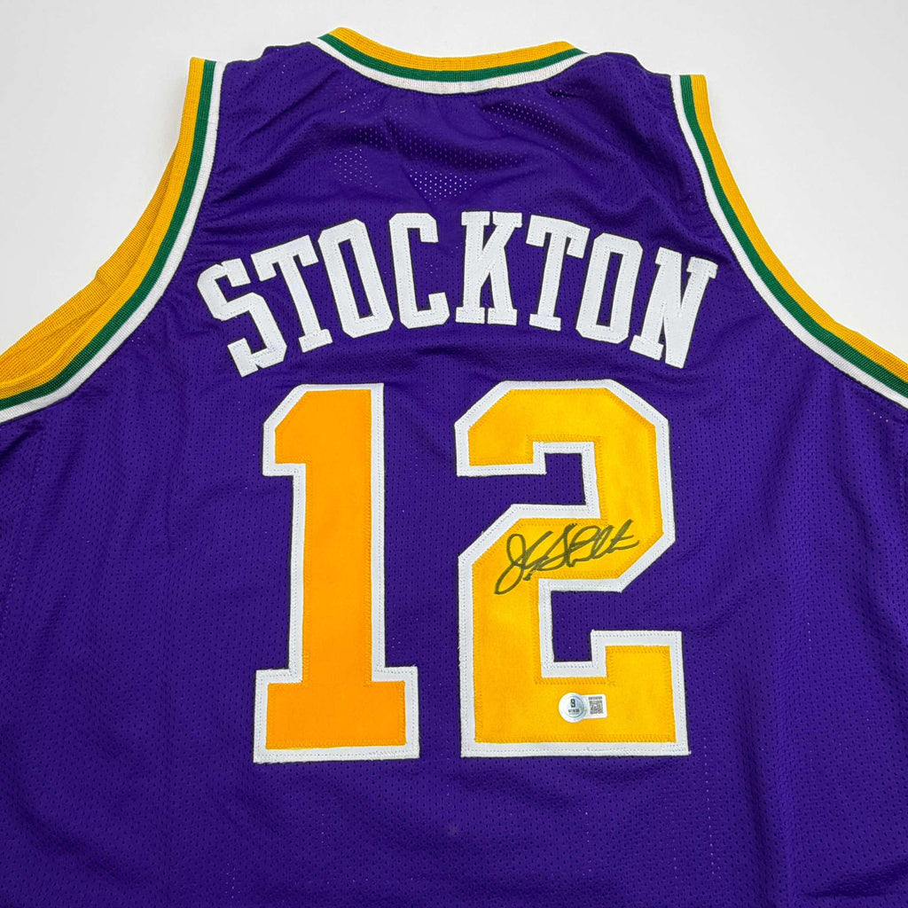 Autographed/Signed John Stockton Utah Purple Basketball Jersey Beckett BAS COA
