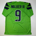 Autographed/Signed Kenneth Walker Seattle Green Football Jersey Beckett BAS COA