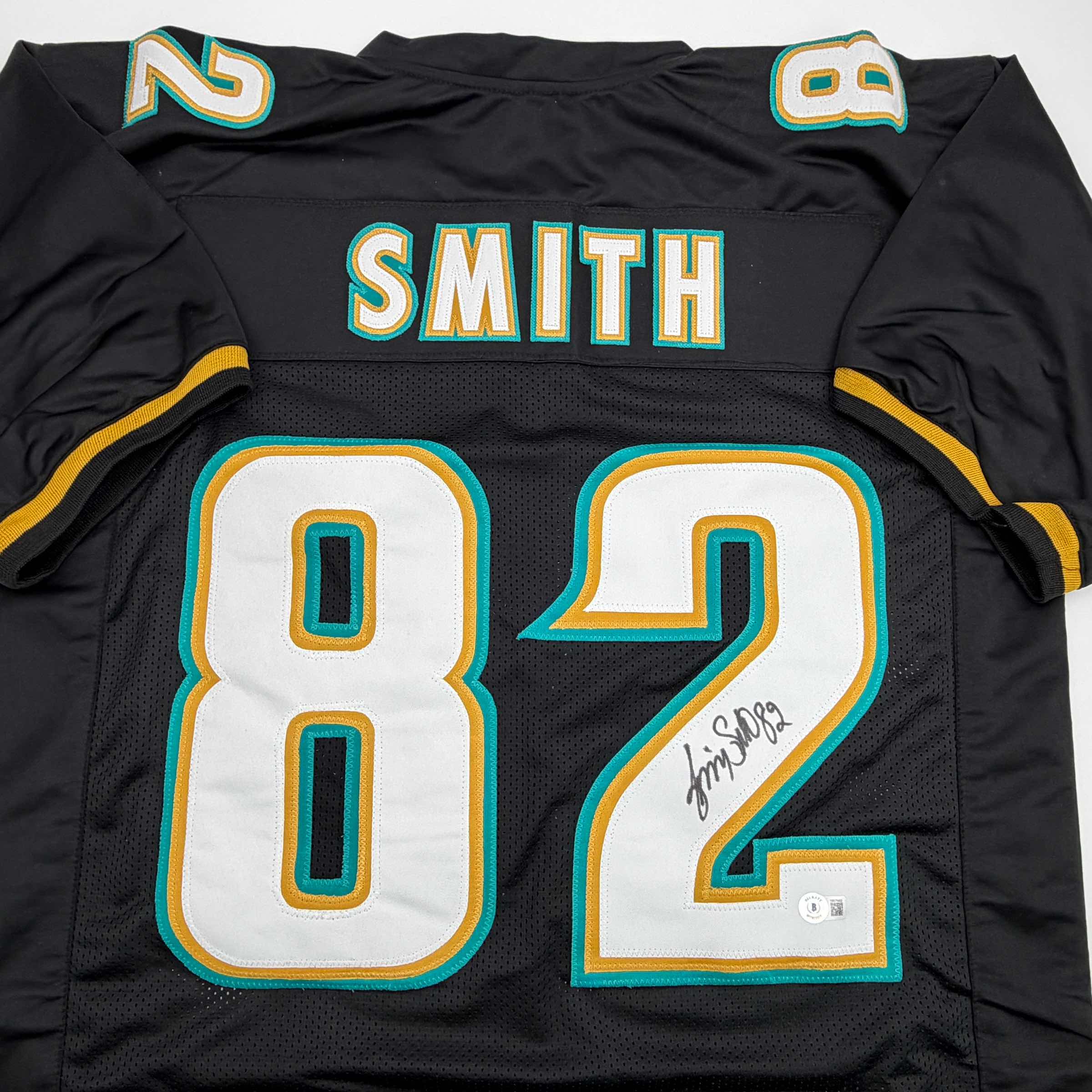 Autographed/Signed Jimmy Smith Jacksonville Black Football Jersey Beckett BAS COA