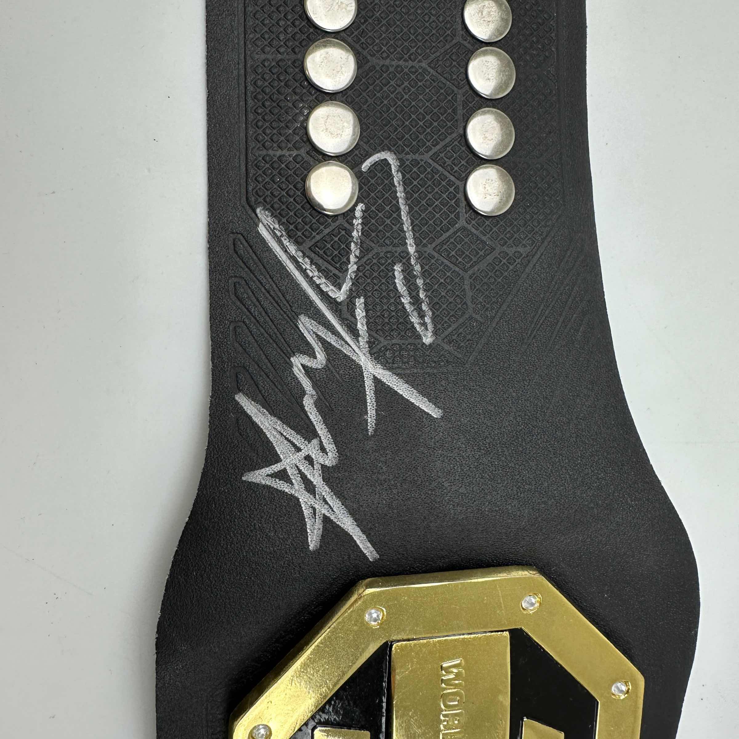 Autographed/Signed Israel Izzy Adesanya Black Replica UFC Championship Title Belt JSA COA