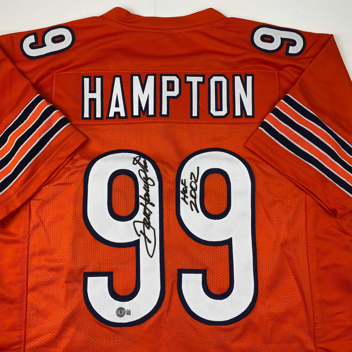 Autographed/Signed Dan Hampton HOF 2002 Chicago Orange Football Jersey Beckett BAS COA