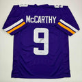 Autographed/Signed J.J. JJ McCarthy Minnesota Purple Football Jersey Beckett BAS COA