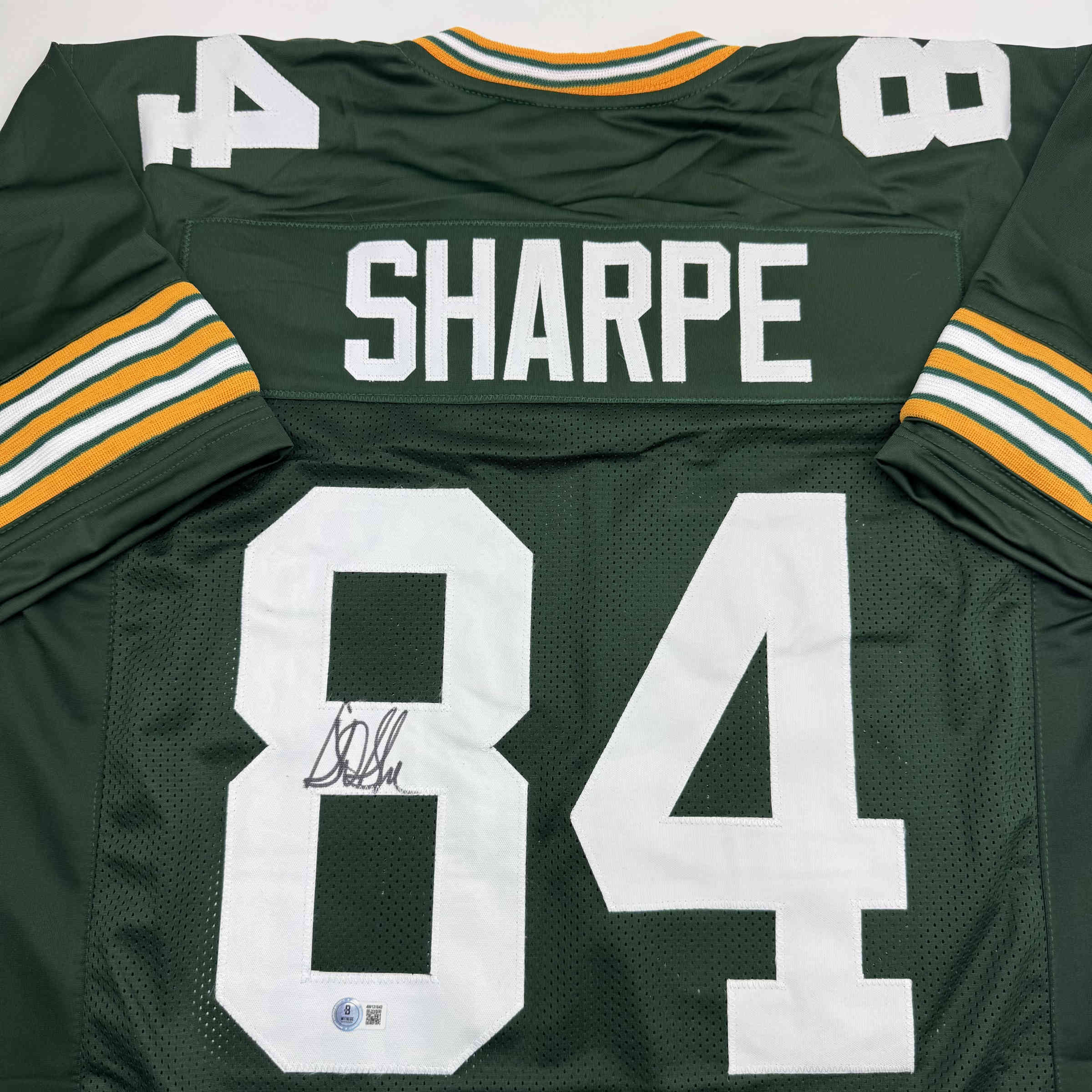 Autographed/Signed Sterling Sharpe Green Bay Green Football Jersey Beckett BAS COA