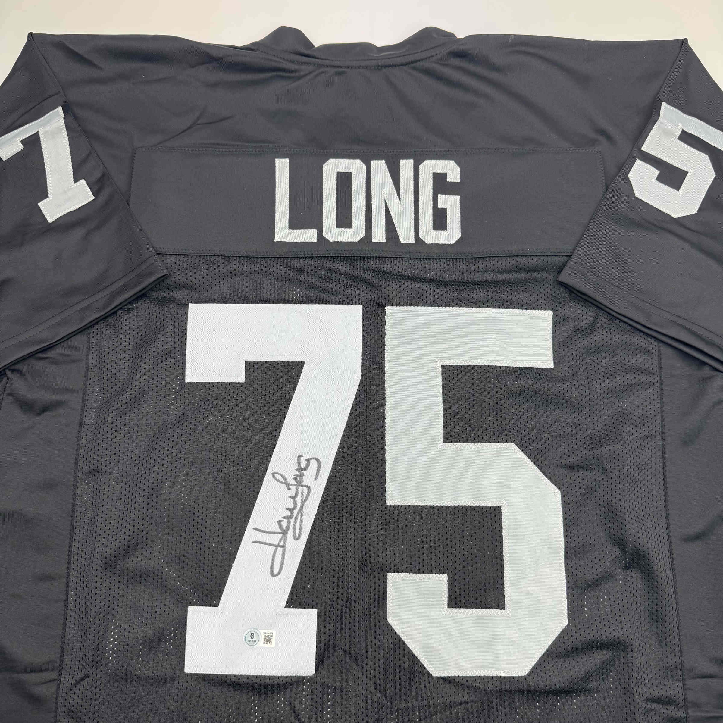 Autographed/Signed Howie Long Oakland White Football Jersey Beckett BAS COA