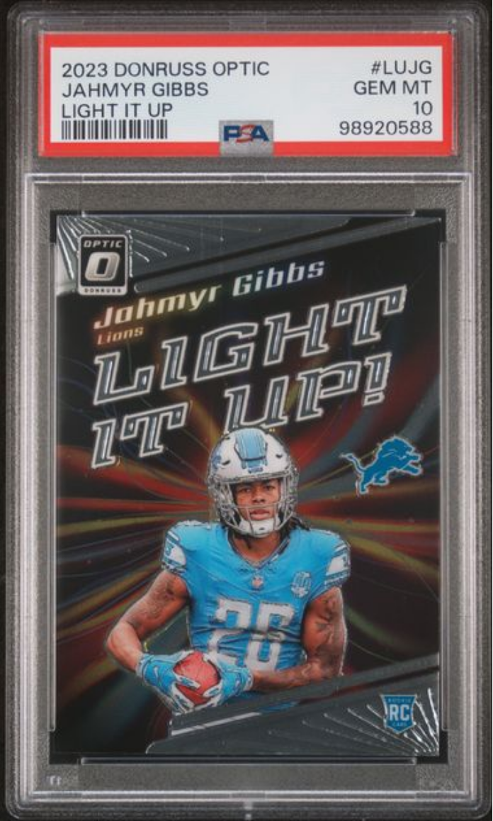 Graded 2023 Panini Donruss Optic Jahmyr Gibbs #LUJG Light It Up Rookie RC Football Card PSA 10 Gem Mint