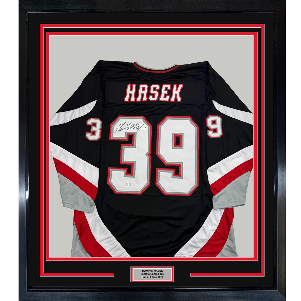 Framed Autographed/Signed Dominik Hasek 35x39 Buffalo Black Hockey Jersey Beckett BAS COA