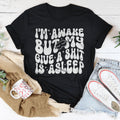 I’m Awake But My Give A Shit Is Asleep Tee