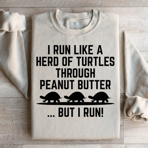 "I Run Like A Herd Of Turtles Through Peanut Butter But I Run!" – Funny Fitness Graphic Pullover