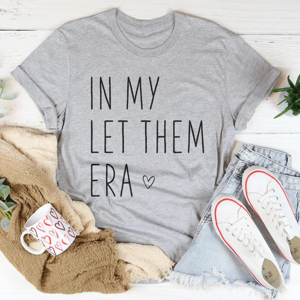 In My Let Them Era Tee