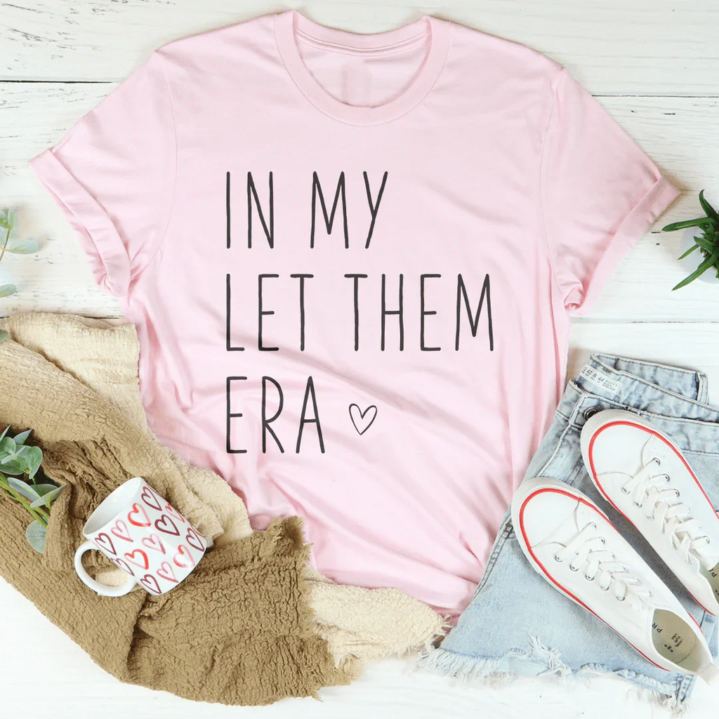 In My Let Them Era Tee