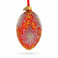 Red and Gold Paisley with Silver Starburst Glass Egg Ornament 4 Inches